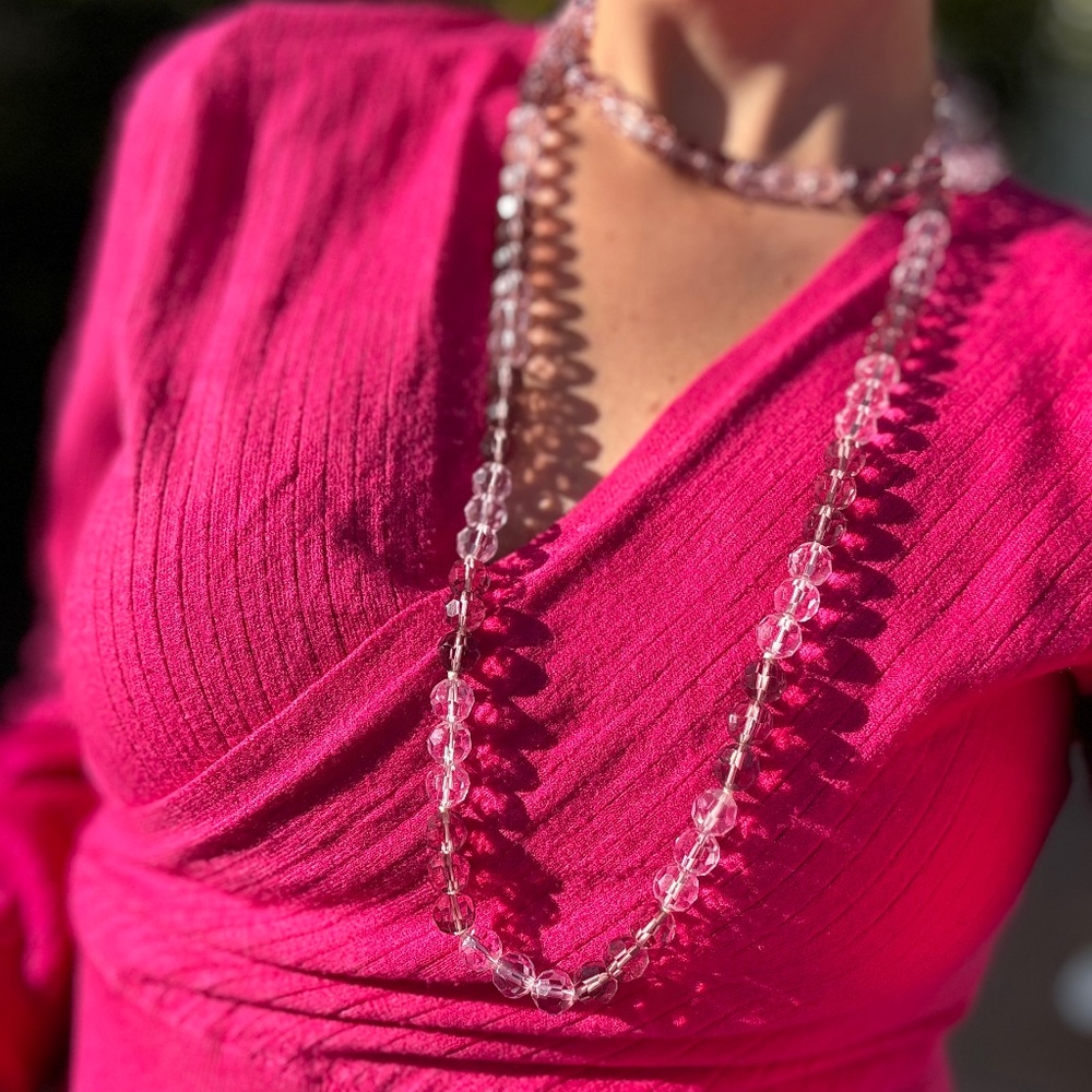 Kanneth Lane necklace with rose quartz crystals.
